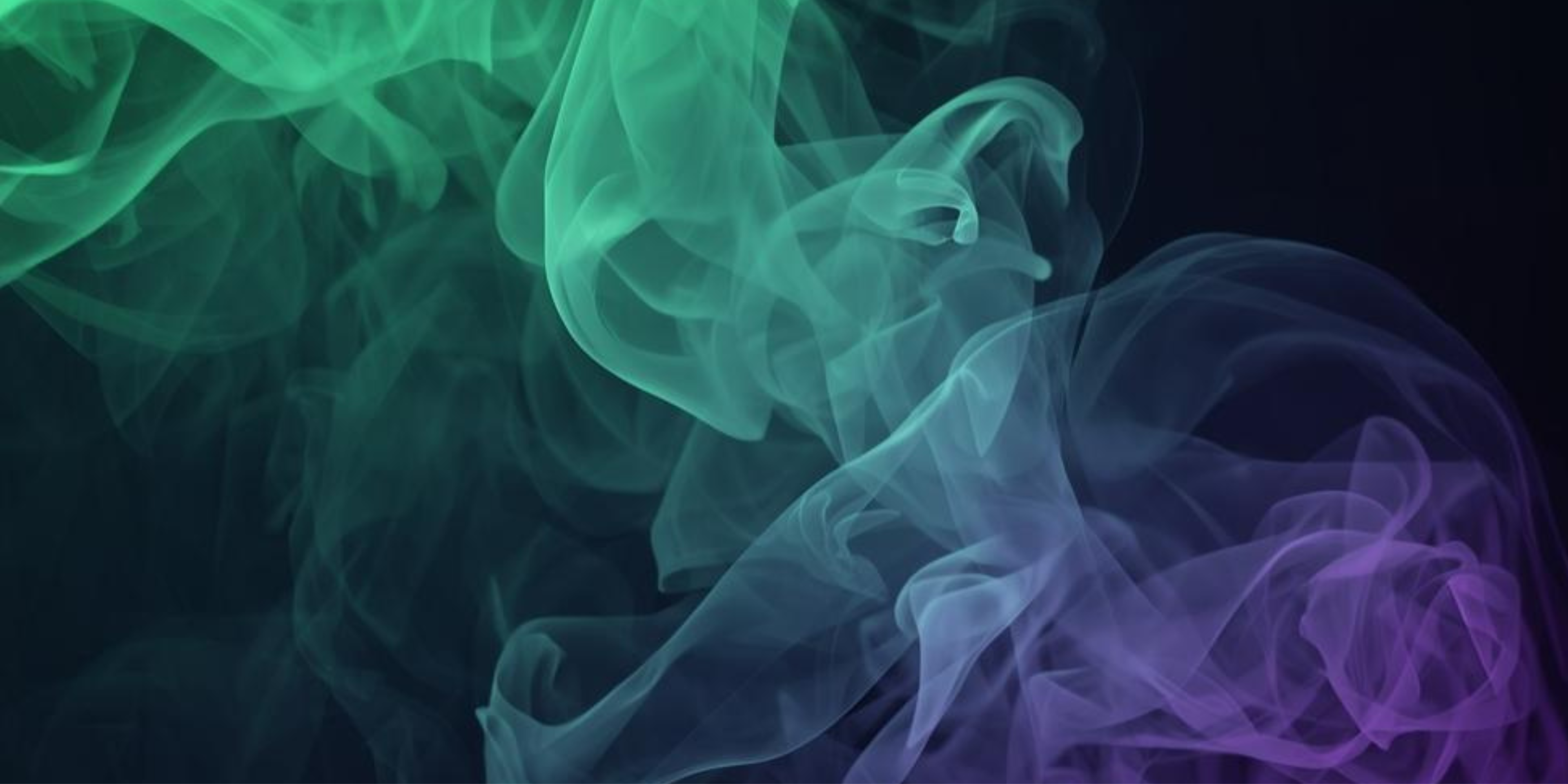 Green and purple smoke on a black background.
