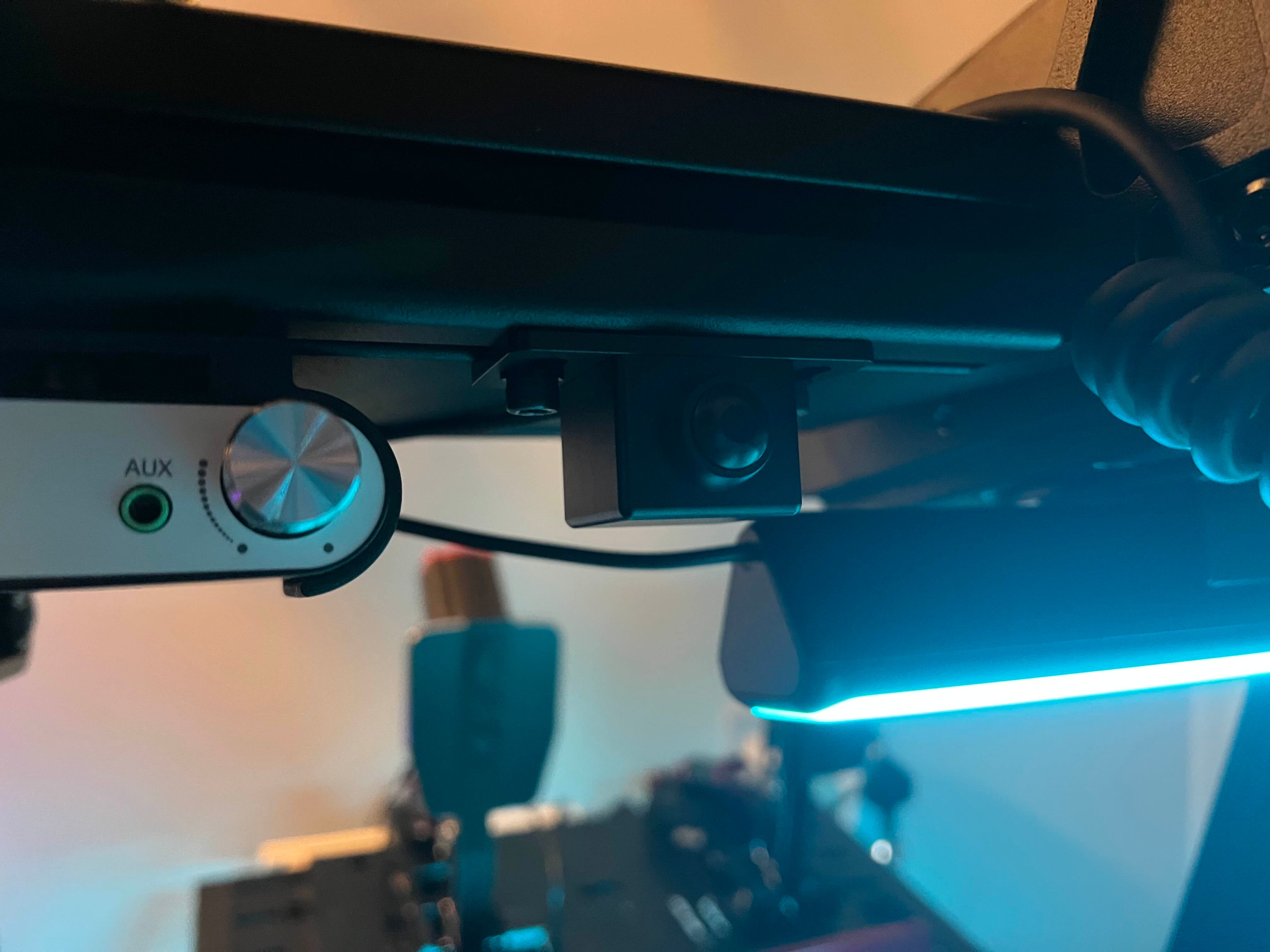 Photo from Jason showing the JCSS power button mounted to a piece of black aluminium profile on his sim rig.