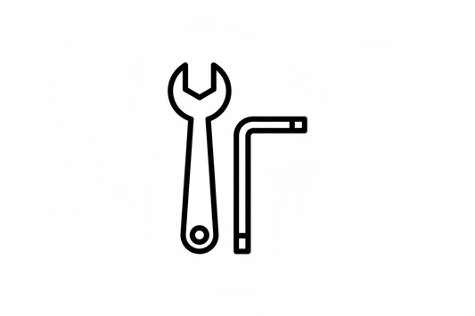 Black line drawing of a wrench and hex key on a white background